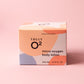 Truly O2 micro-oxygen body lotion box in front of salmon background